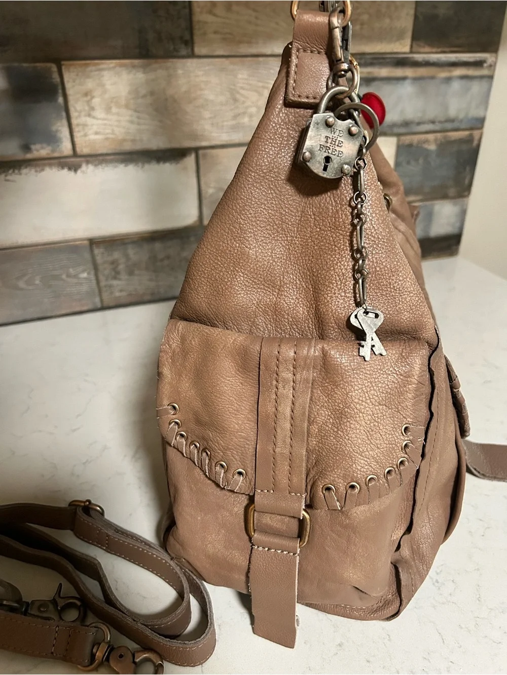 LIKE NEW We The Free Leigh Hobo Distressed Leather Tote in Saddle With Charms